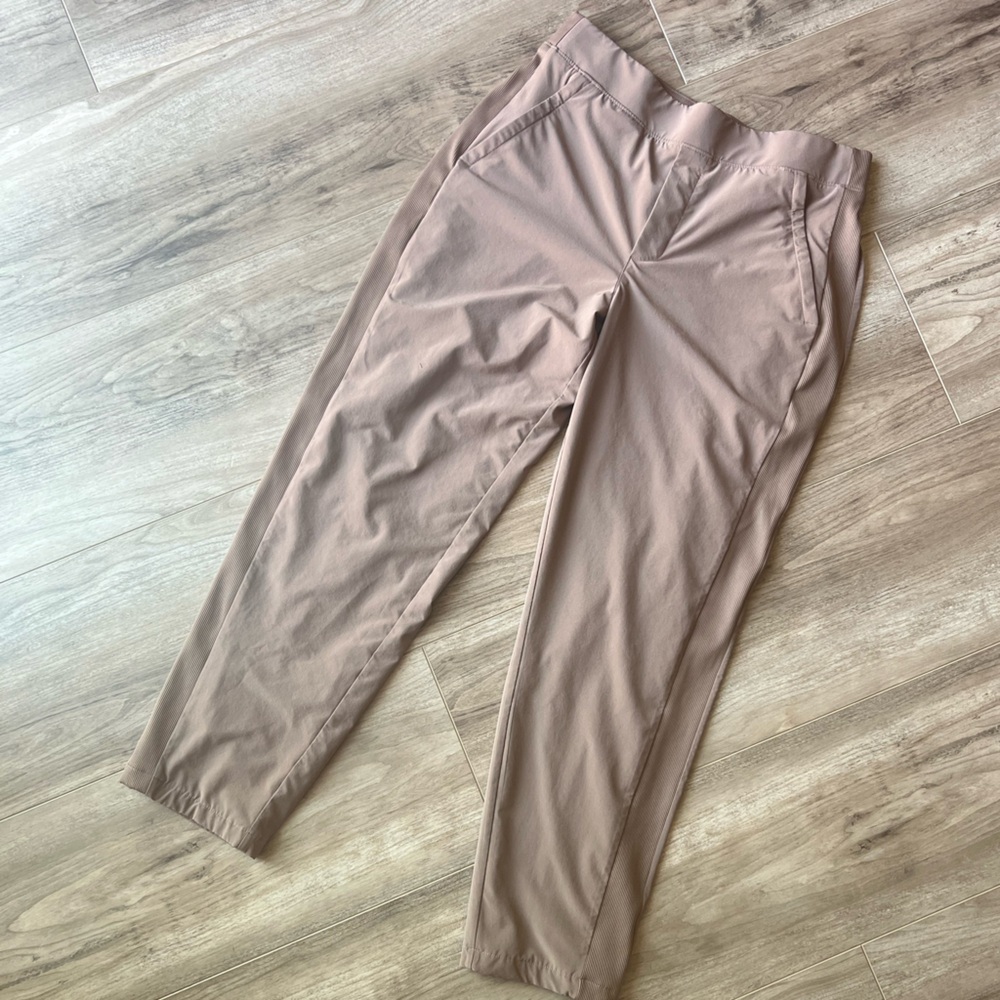 Athleta khaki lined jogger size 8 with zippers pockets very good condition